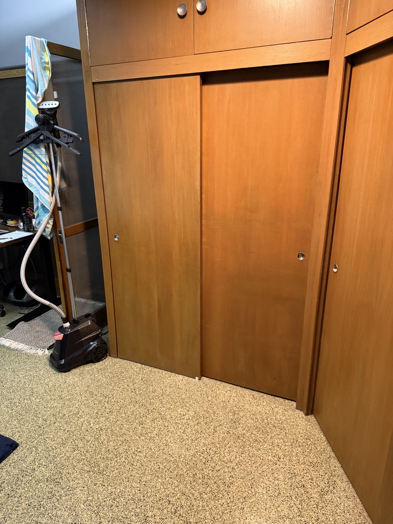 Repaired Breeds interior sliding wood doors